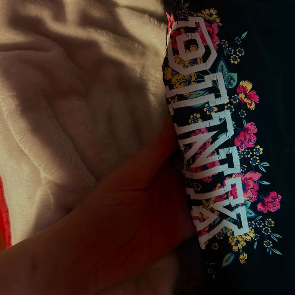 Women’s medium Victoria secret floral black leggings.
